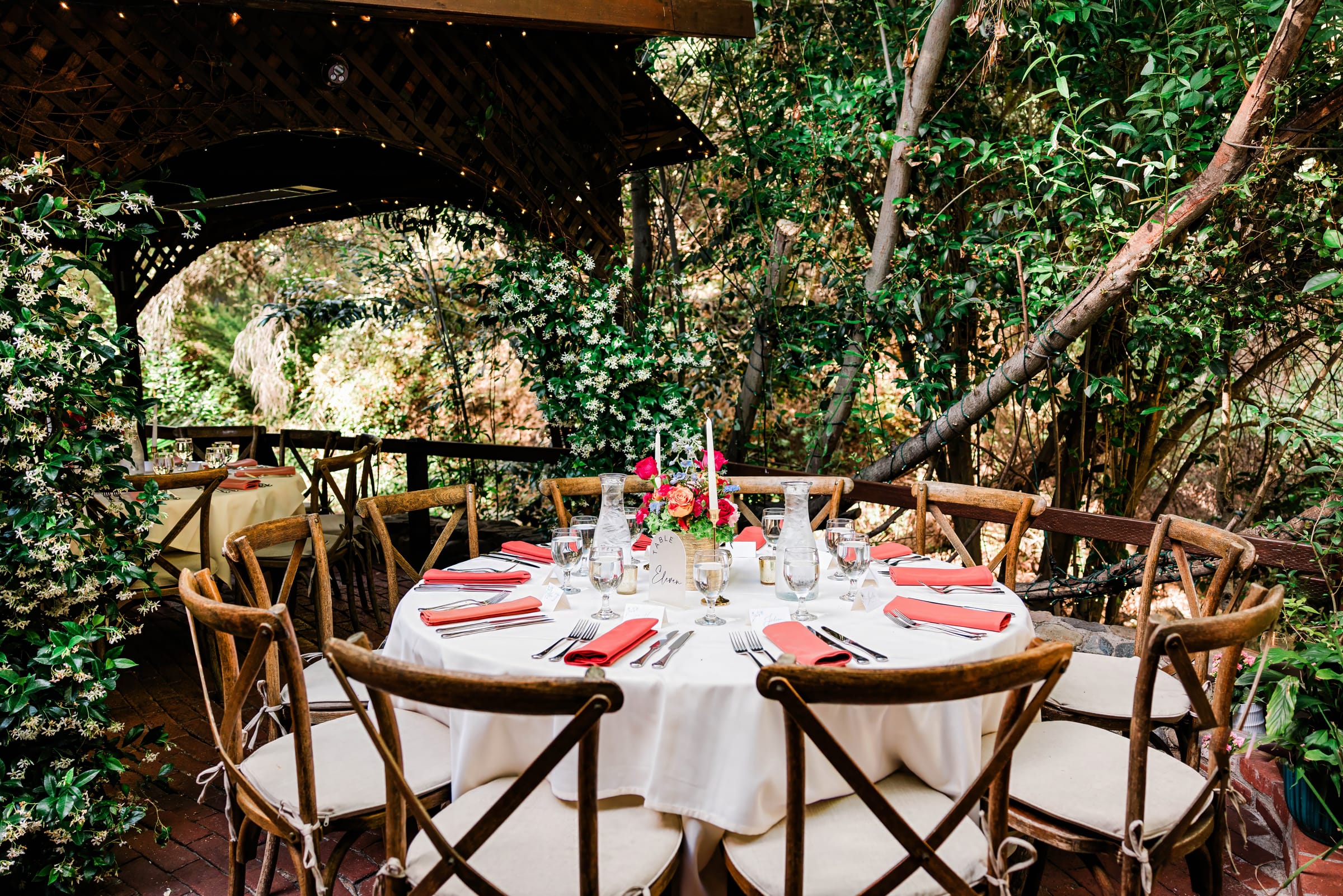 Candlelit garden table set among the canyon greenery, Inn of the Seventh Ray